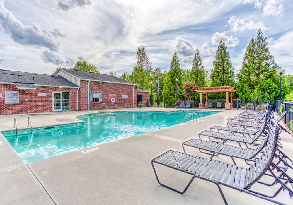 Pool with lounge beds and gazebo at  Battleground North in Greensboro, North Carolina