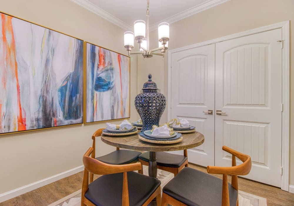 Dining room with room for four and large two-door pantry at Greymont Village in Asheville, North Carolina