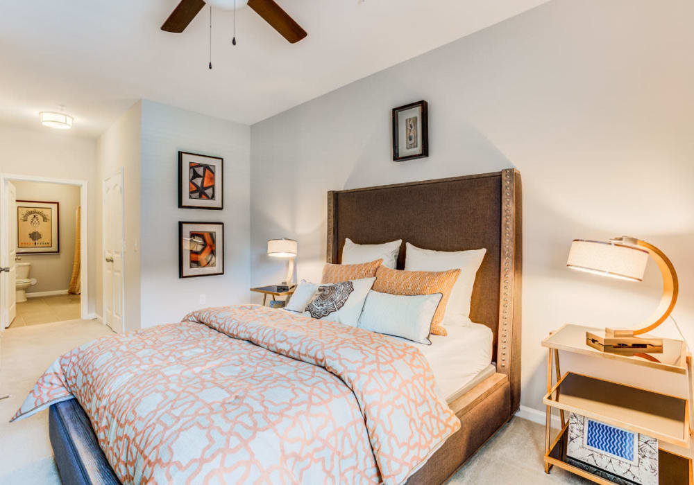 Cozy bedroom at Bacarra Apartments in Raleigh, North Carolina