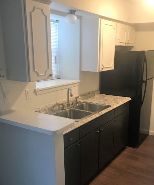 Stainless-steel appliances in an apartment at The 603 in Bryan, Texas