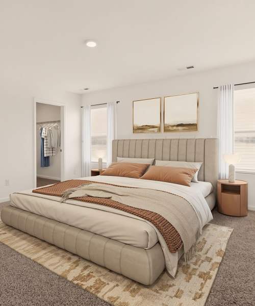 Bed with decorative pillow at Brixin Sonora in Fort Wayne, Indiana