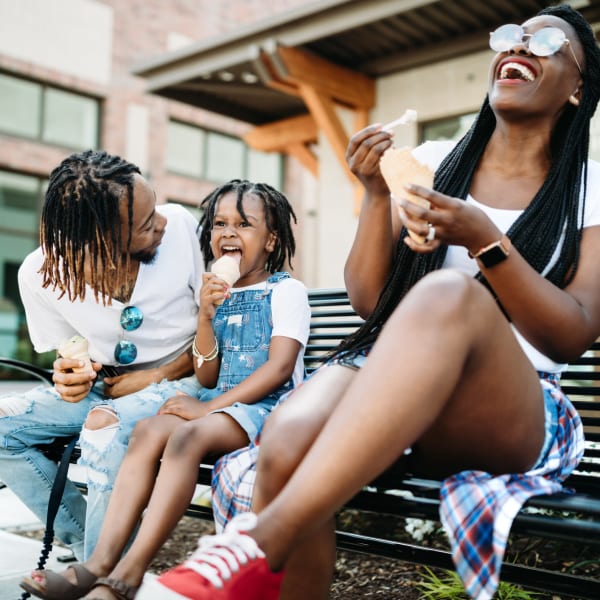 A family eating ice cream at Station 21 Apartments in Mesa, Arizona