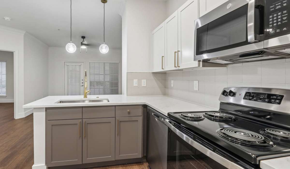 Kitchen with premium features at Calder in Round Rock, Texas 