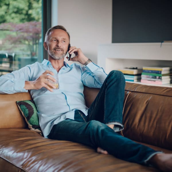 A resident relaxes in his apartment at Acclaim at Cary Pointe, Cary, North Carolina