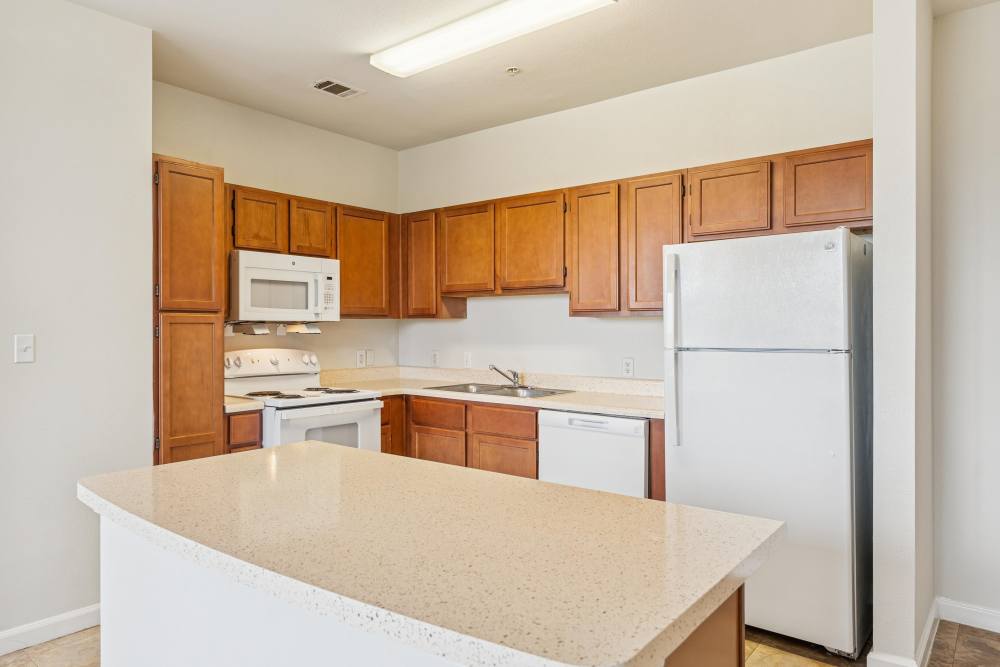 Kitchen with a kitchen island at Costa Vizcaya in Houston, Texas