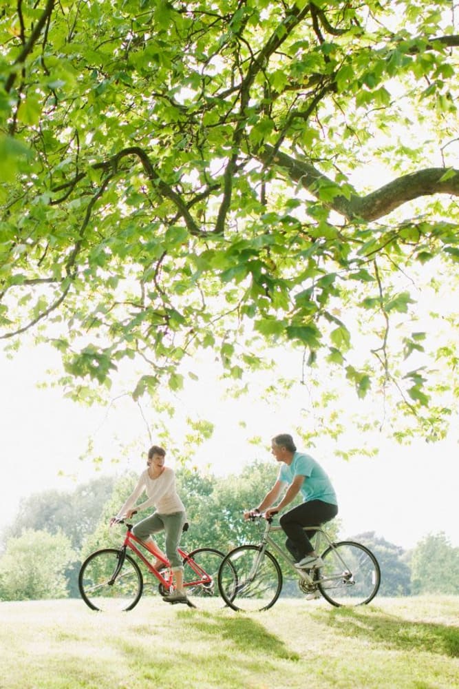 Resident going for a bike ride near Campbell Flats Apartments in Springfield, Missouri