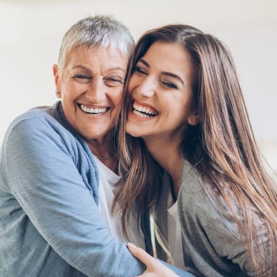 Resident and daughter hugging at Ebenezer Ridges Campus in Burnsville, Minnesota