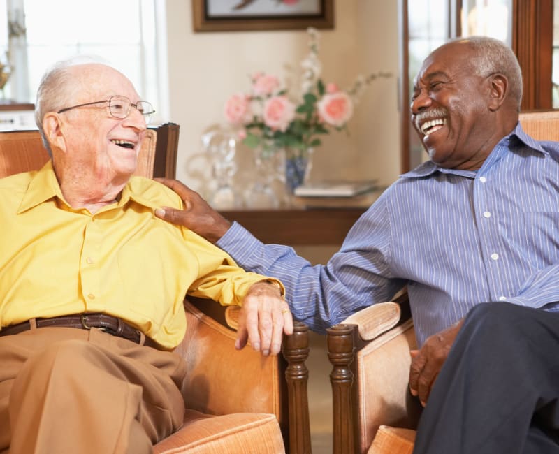 Two men talking together at The Sanctuary at St. Cloud in St Cloud, Minnesota