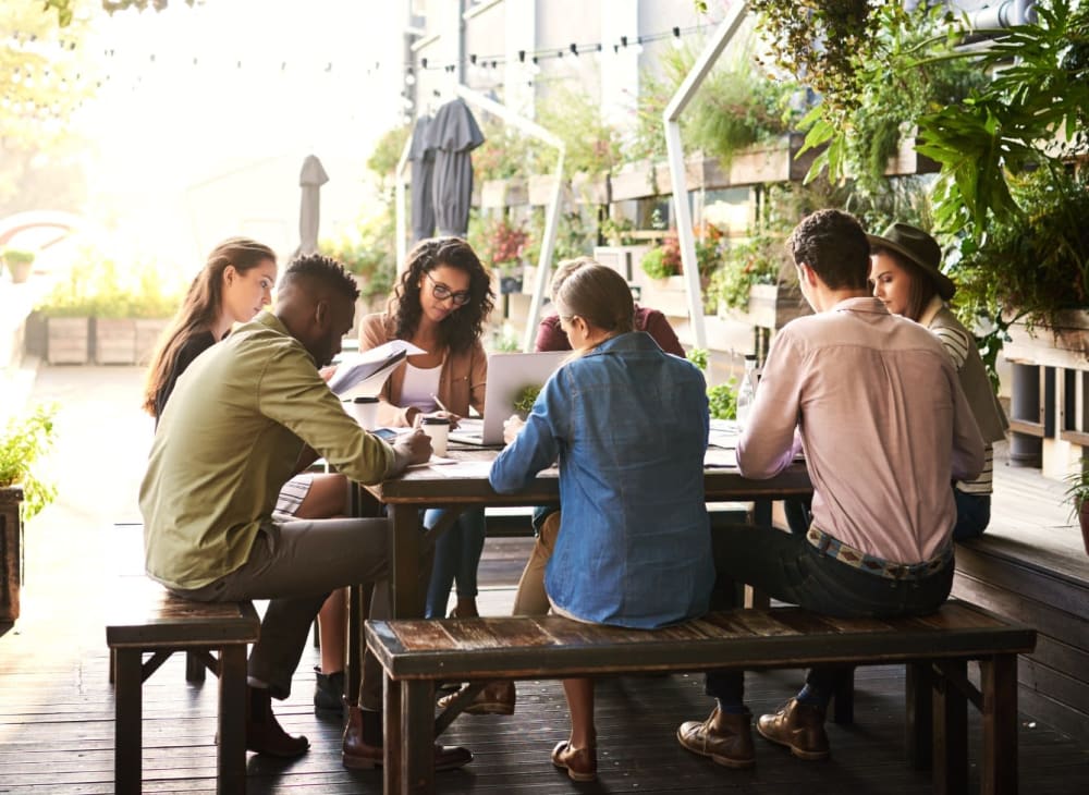 Residents enjoying a meal at Chesterton Townhomes in San Diego, California