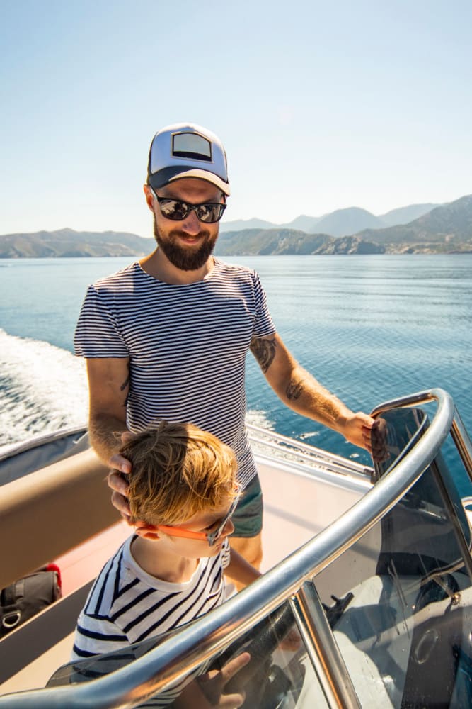 StoreLine boat storage customer enjoying a day on the lake with his son