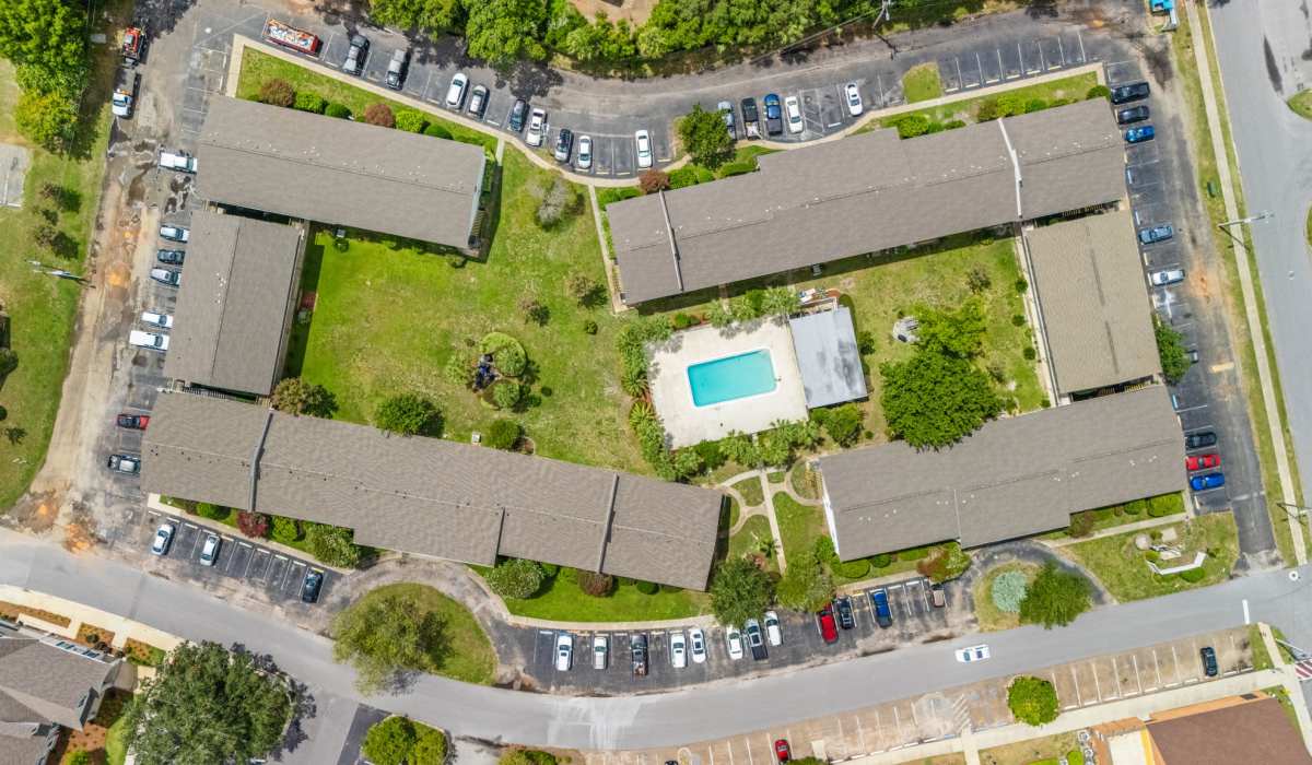 Apartment community with pool at Breeze Apartments in Gulf Breeze, Florida