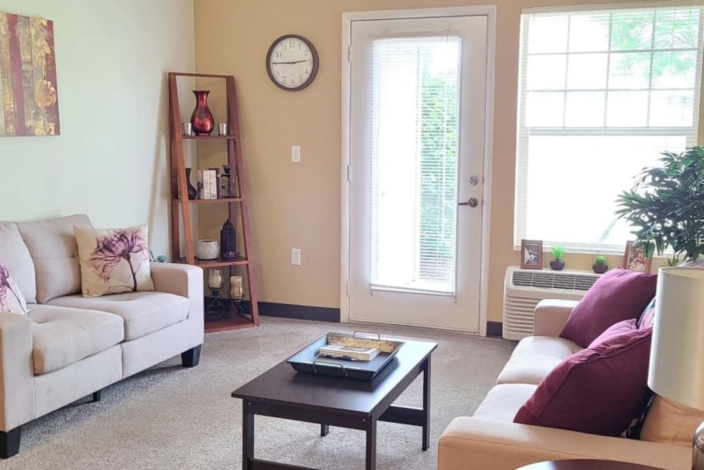 Spacious living room of senior living apartment at Lakeland Senior Living in Eagle Point, Oregon. 