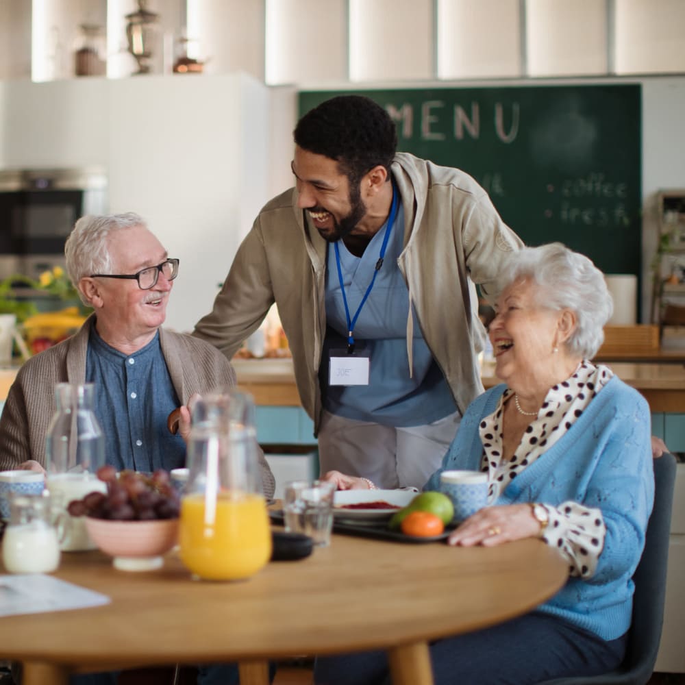 Residents being waited on at Regency Pacific Management in Bellevue, Washington