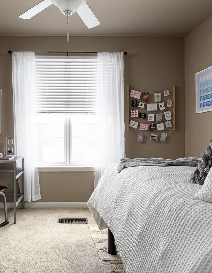 Bedroom with large window at The Wyatt in Lexington, Kentucky