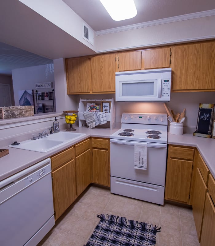 Kitchen with granite countertops at The Remington Apartments in Wichita, Kansas