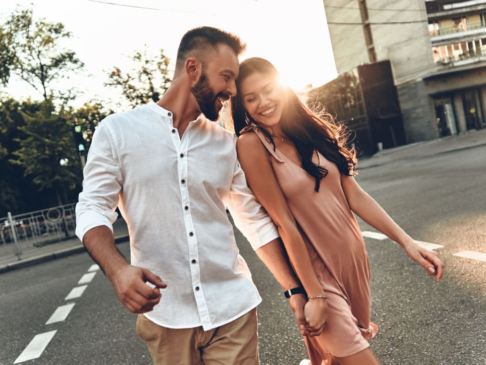 Resident couple walking downtown near Villa Vita Apartments in Peoria, Arizona