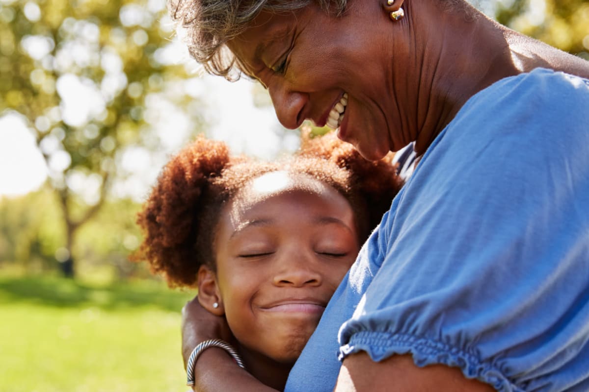 Resident with grandchild at The Commons at Elk Grove in Elk Grove, California