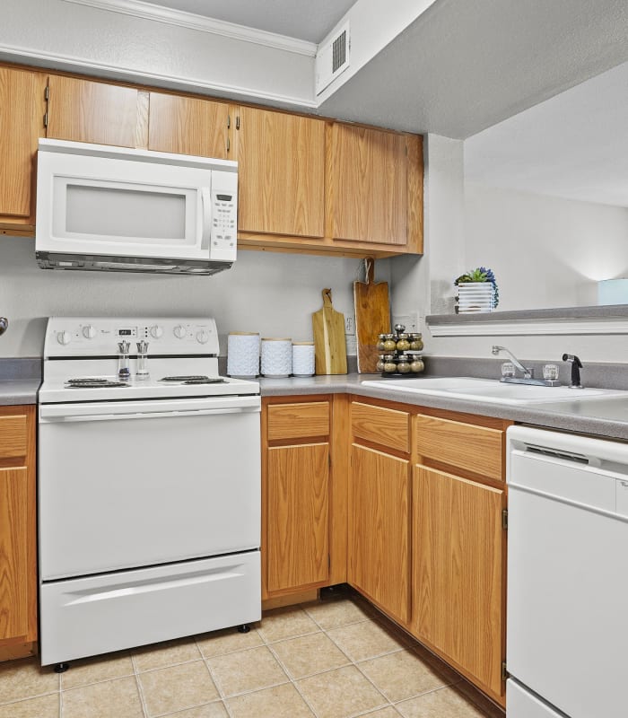 Kitchen with new cabinets at The Remington Apartments in Wichita, Kansas