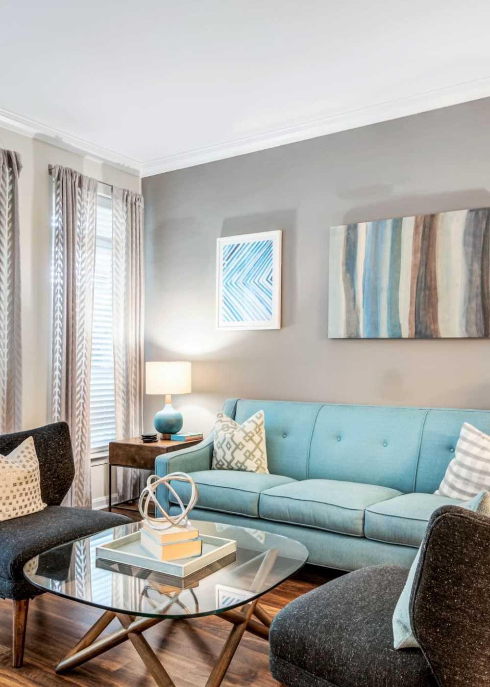 Living room with coffee table at Jefferson Arbors at Broadlands in Ashburn, Virginia