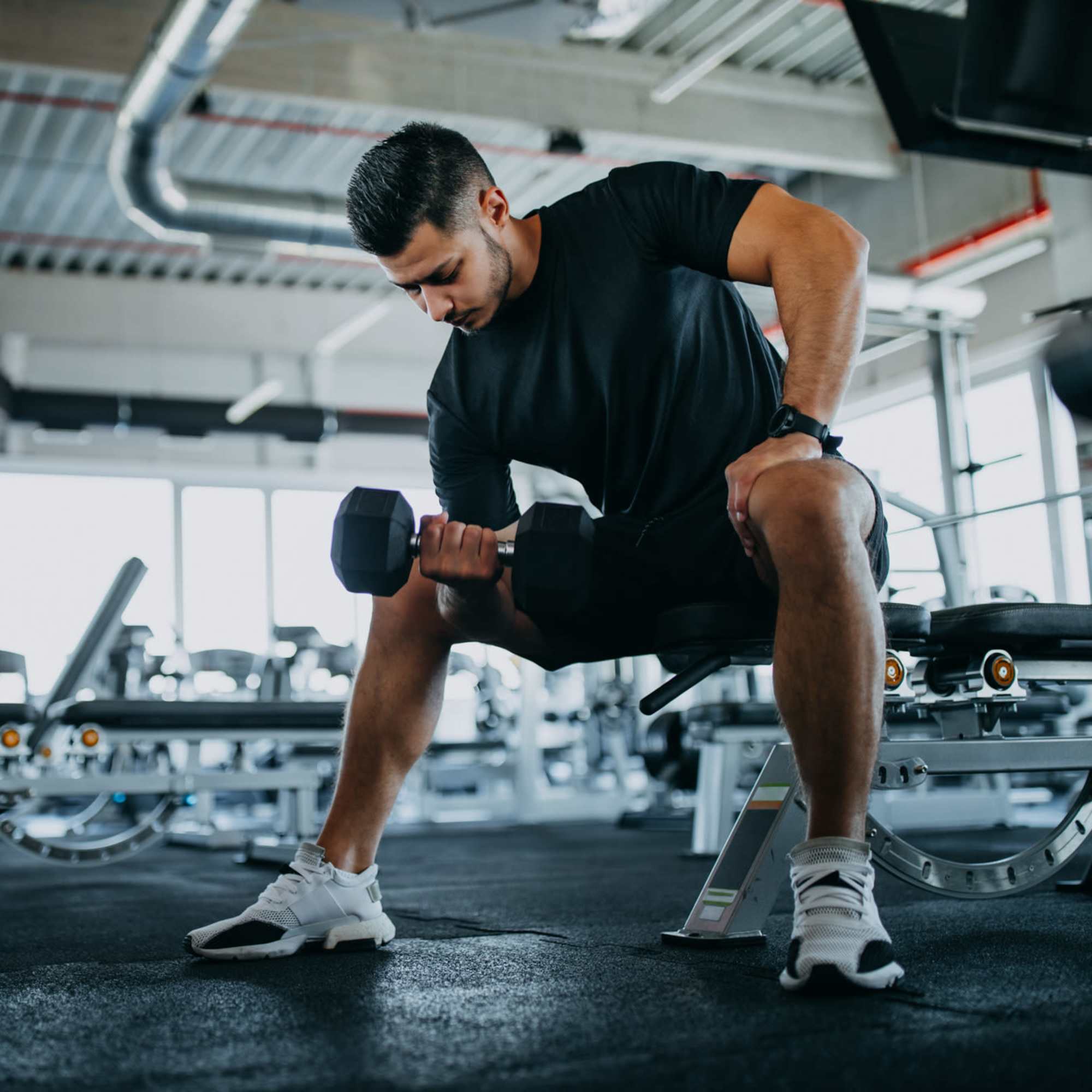 Resident doing workout in fitness center at Delco Lofts in Dayton, Ohio