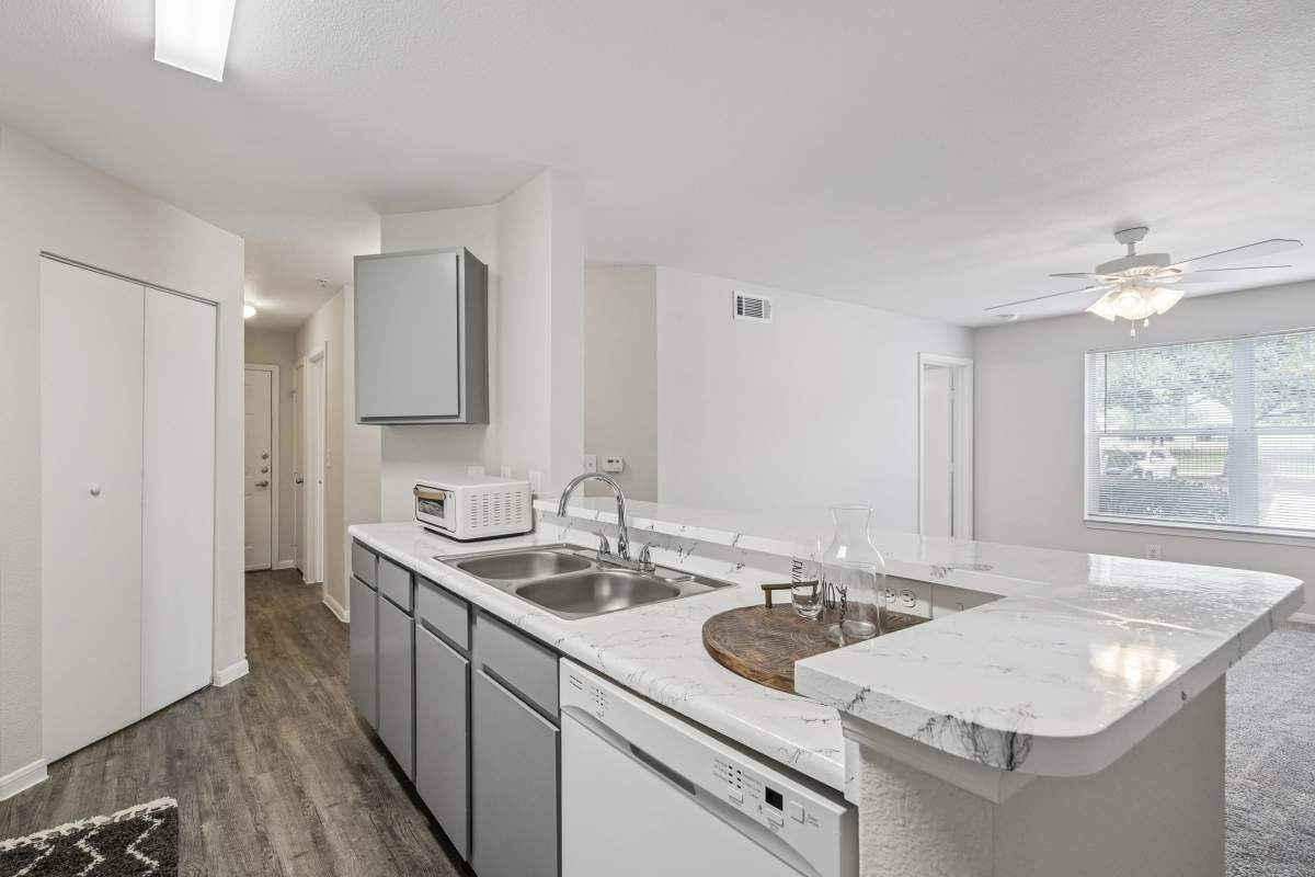 Kitchen counter with sink at Kimberly Pointe in Houston, Texas