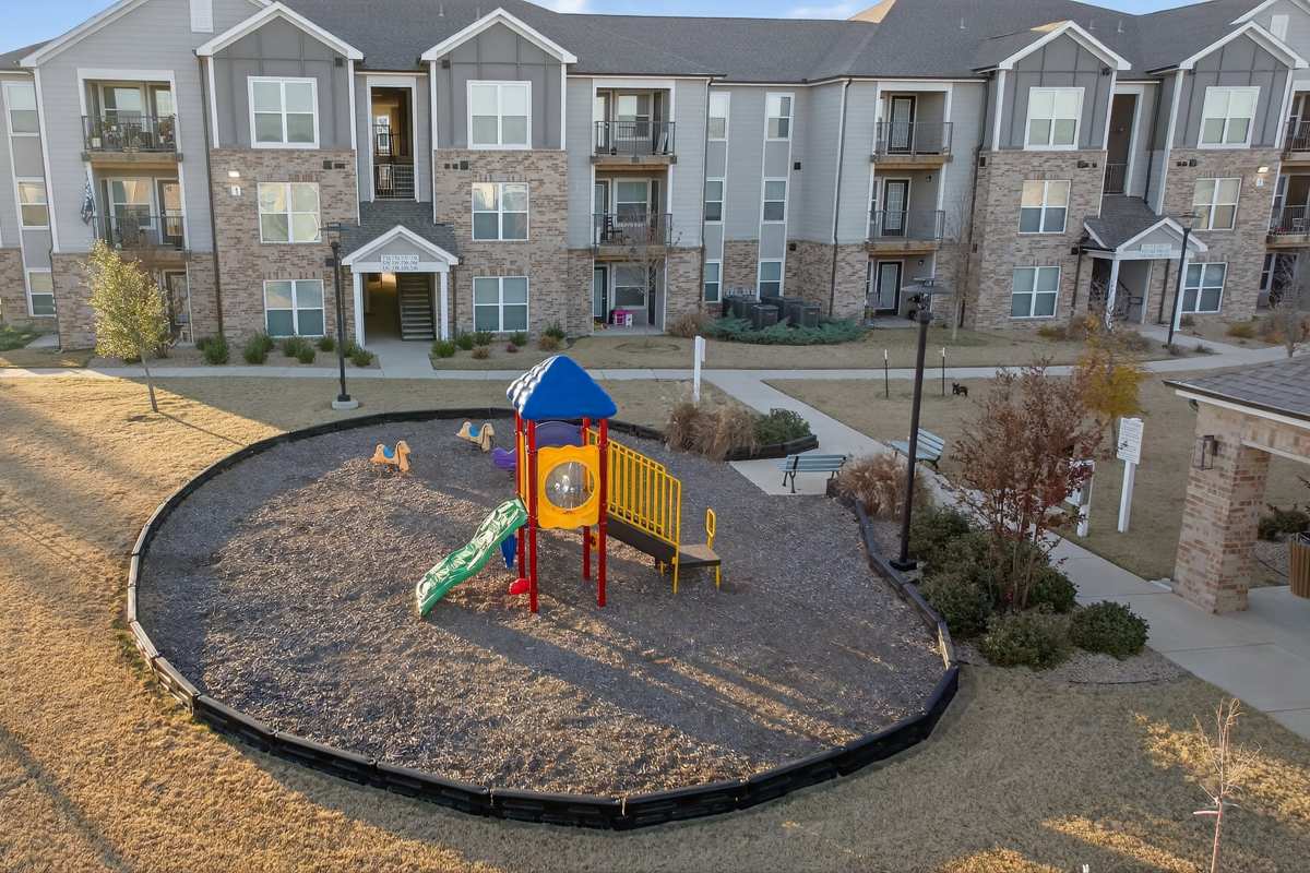 Playground area with slides area at Juniper Pointe in Kaufman, Texas