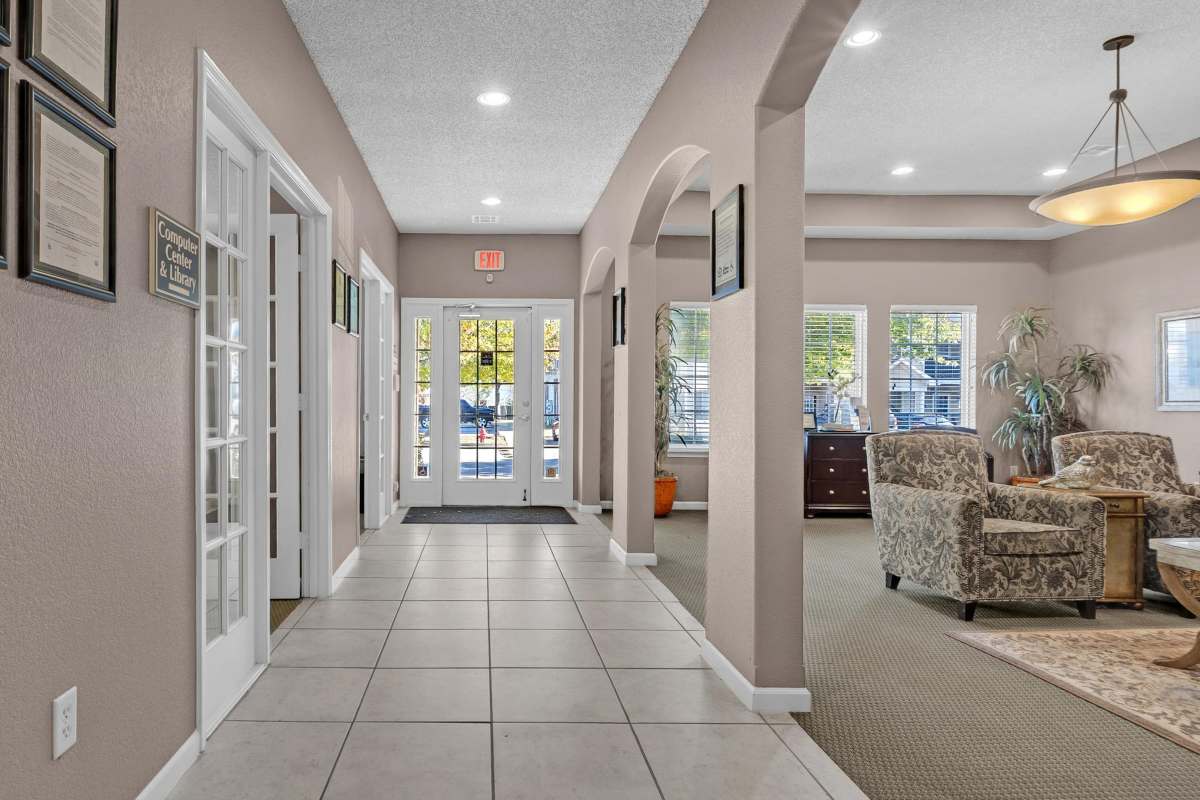 Inviting foyer featuring elegant archways, spacious layout, and abundant natural light at Rolling Meadows Apartments in Glenpool, Oklahoma.