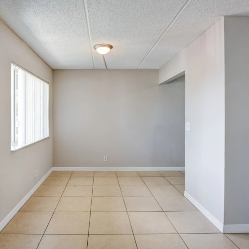 Apartment living room at Coronado Springs East in Palm Springs, Florida