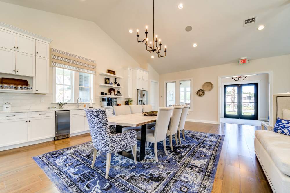 Modern vibrant kitchen with dining space at Seaglass Cottage in North Myrtle Beach, South Carolina