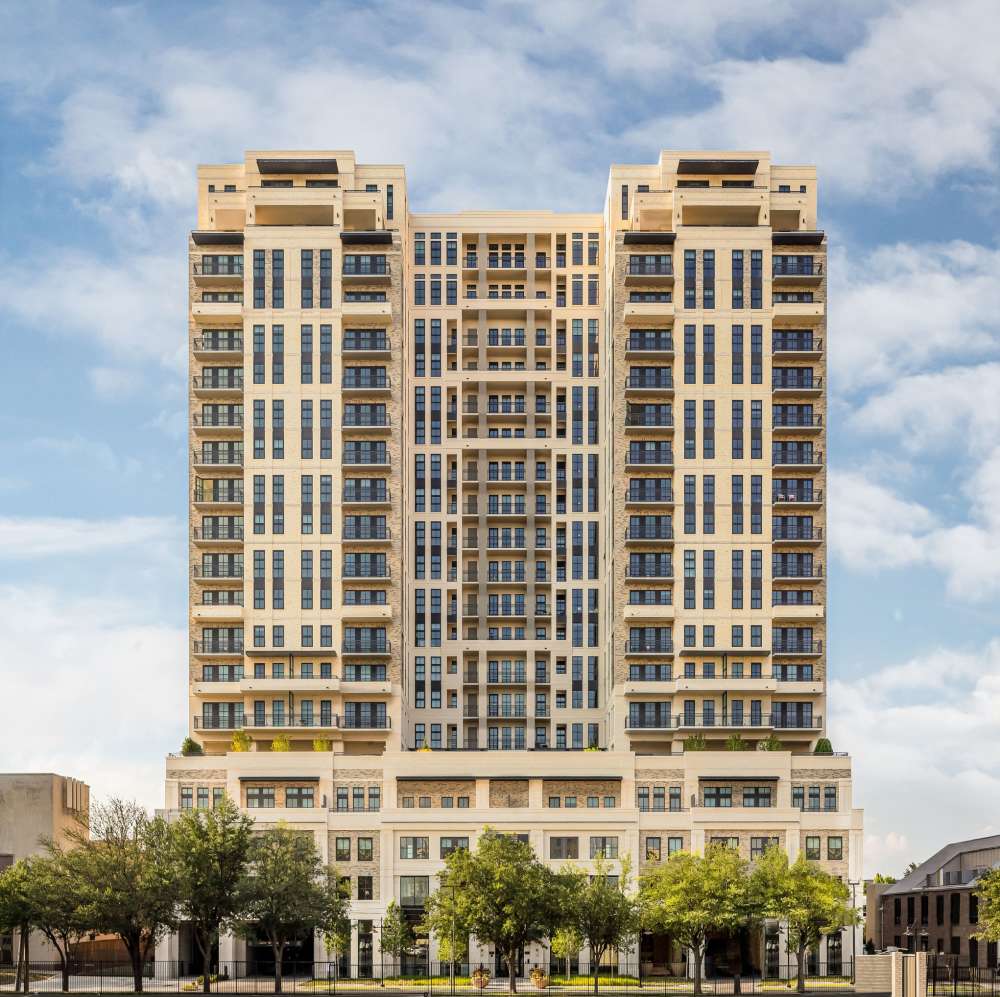 Modern apartment community with multiple stories at Novel Turtle Creek in Dallas, Texas