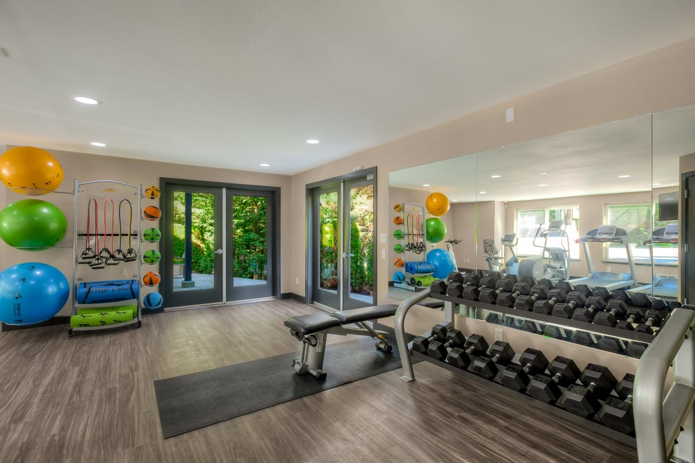 Clean, modern community gym at Karbon Apartments in Newcastle, Washington