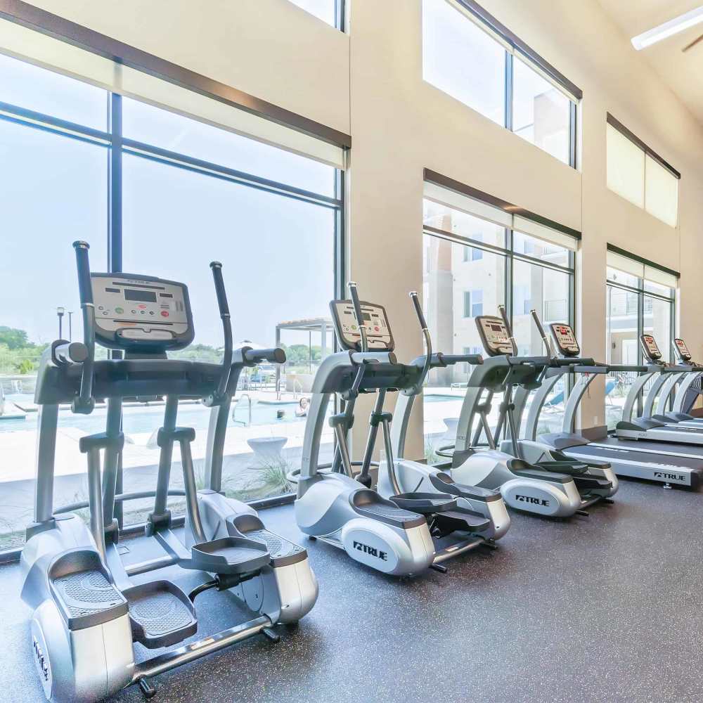 Fitness center at Millennium Place in Corinth, Texas