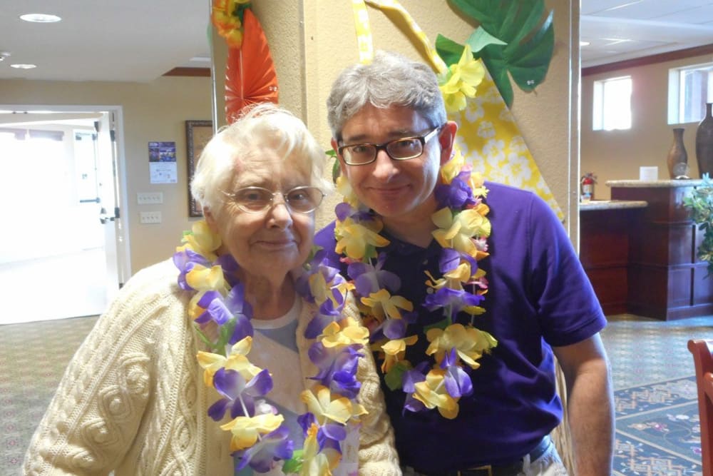 A resident couple at a luau party at Merrill Gardens at Gilroy in Gilroy, California. 