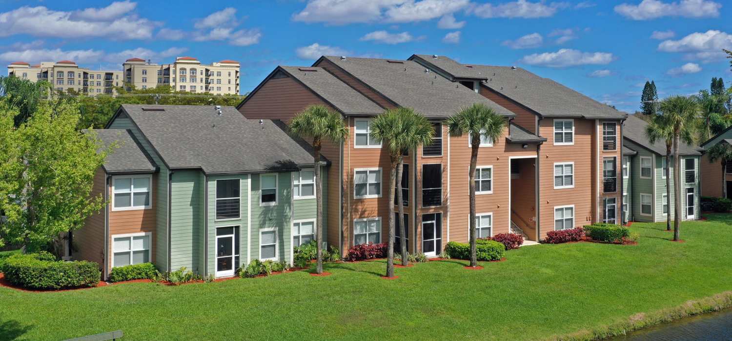 Lots of walking paths surrounding the lake at Visions at Willow Pond apartments in West Palm Beach, Florida