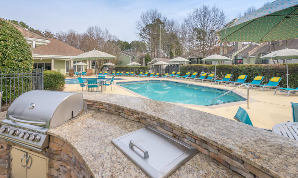 Poolside BBQ with tons of space to cook for all your friends at The Madison in Charlotte, North Carolina