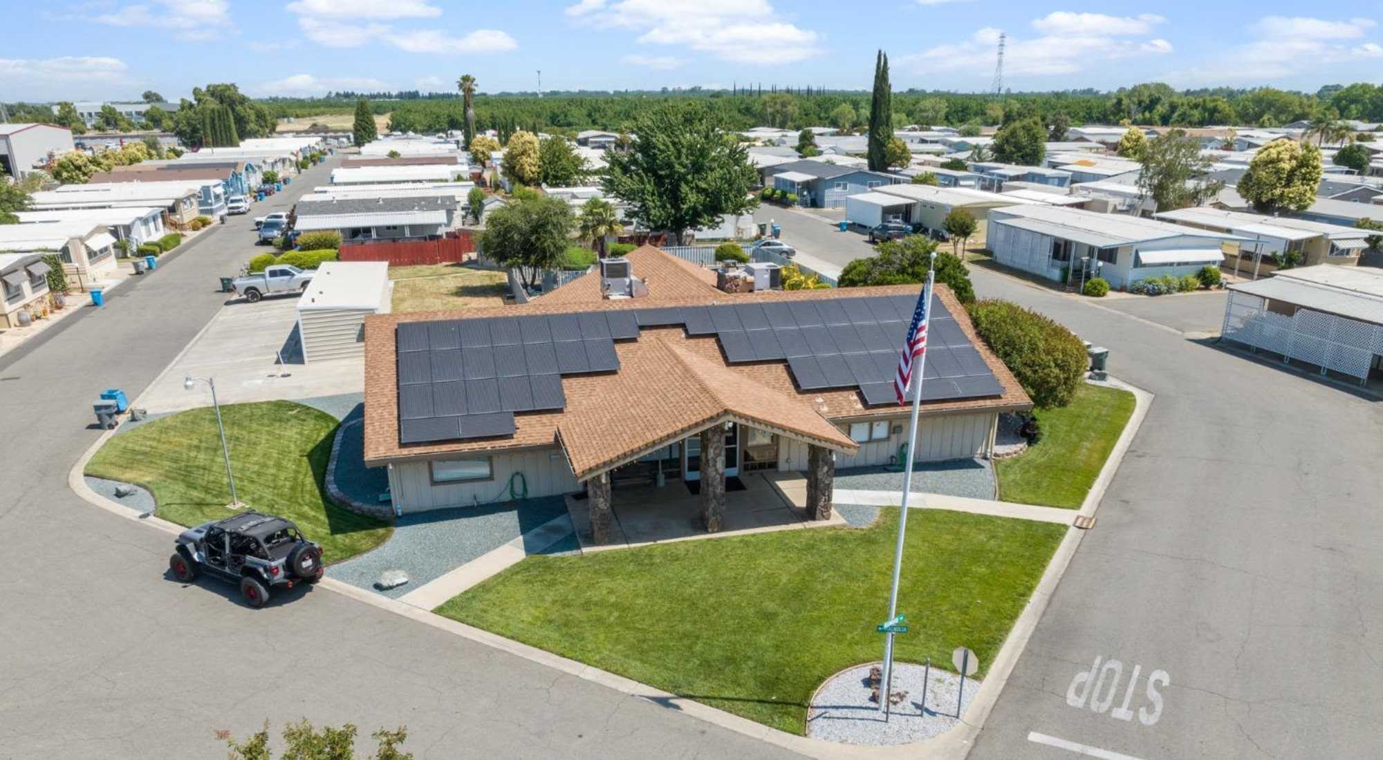 Aerial view of apartments at Village Green Mobile Home Park in Yuba City, California 