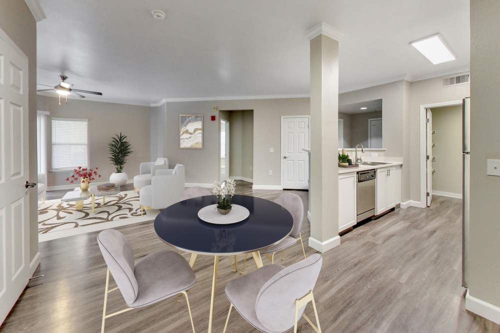 Spacious living area with dining space at Avion Apartments in Rancho Cordova, California