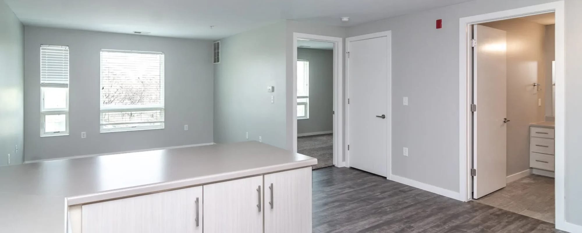 Unfurnished living room with wood-style flooring at 30 Metro in Omaha, Nebraska