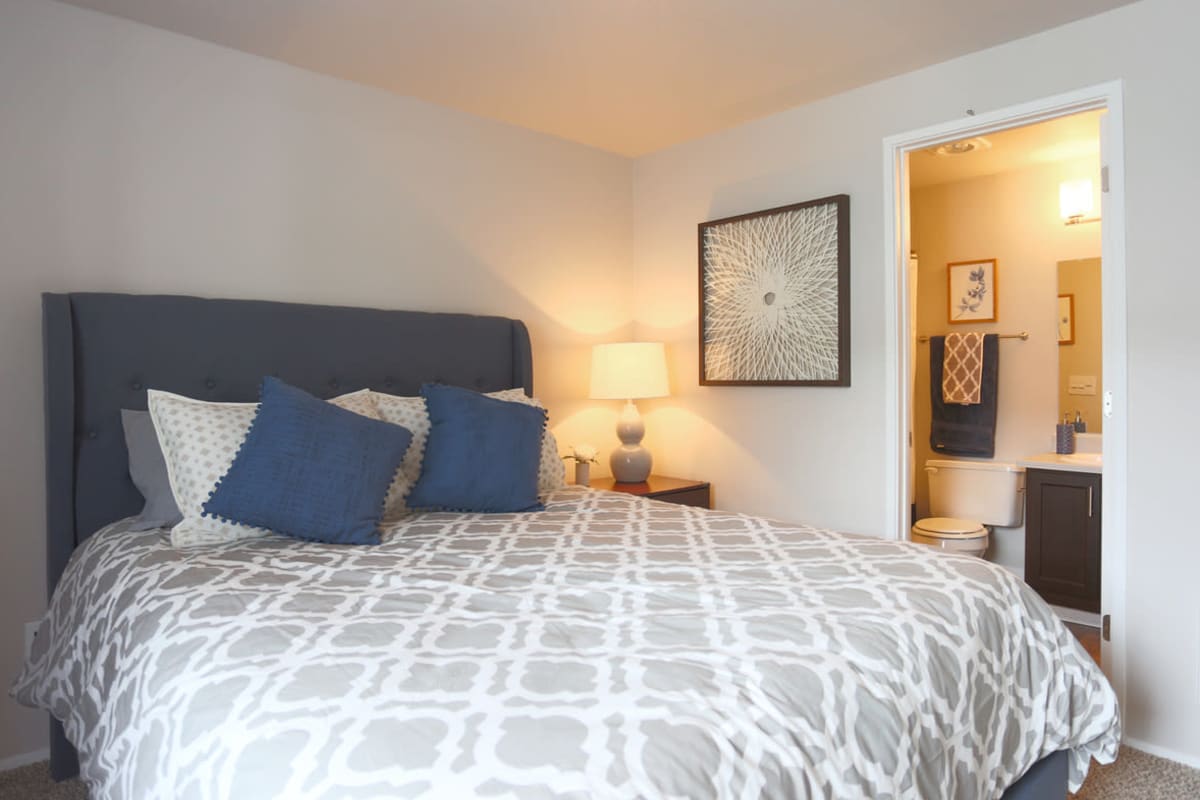 Apartment bedroom with a bathroom at Boulder Creek in Wilsonville, Oregon