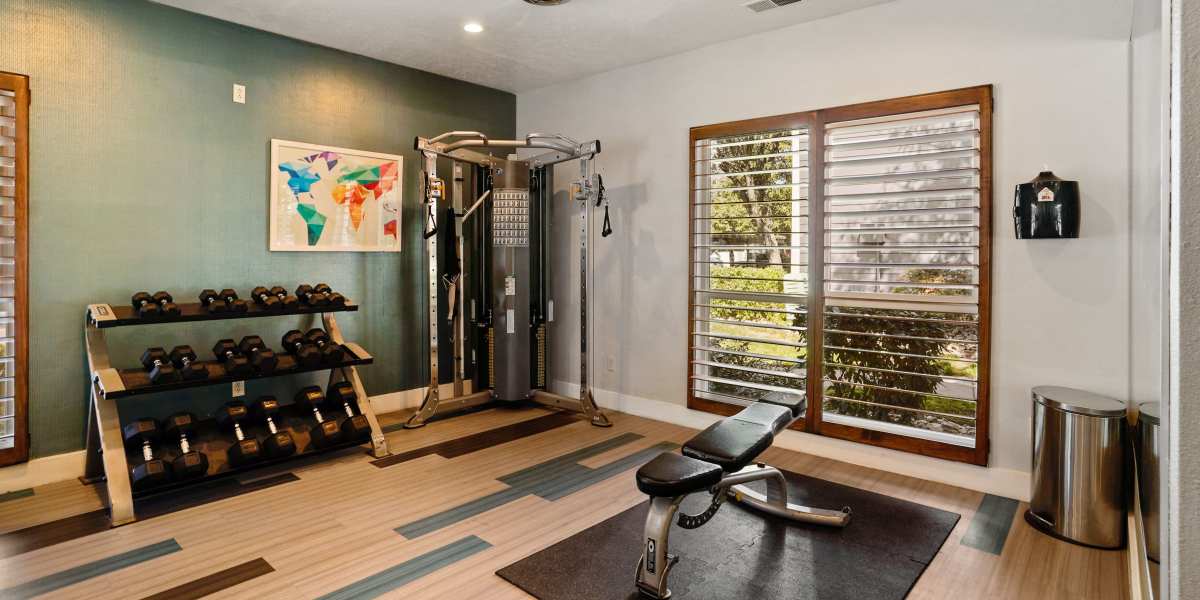 Fitness center with plenty of individual workout stations at Royal Ridge Apartments in Midvale, Utah
