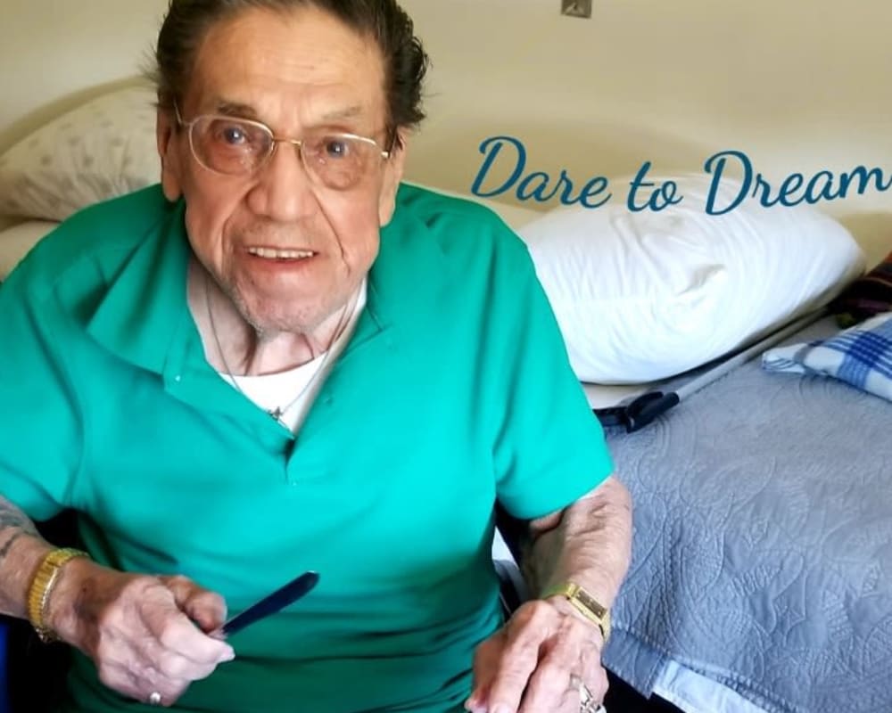Resident Louie enjoying a steak dinner for his Dare to Dream event at Landings of Blaine in Blaine, Minnesota.