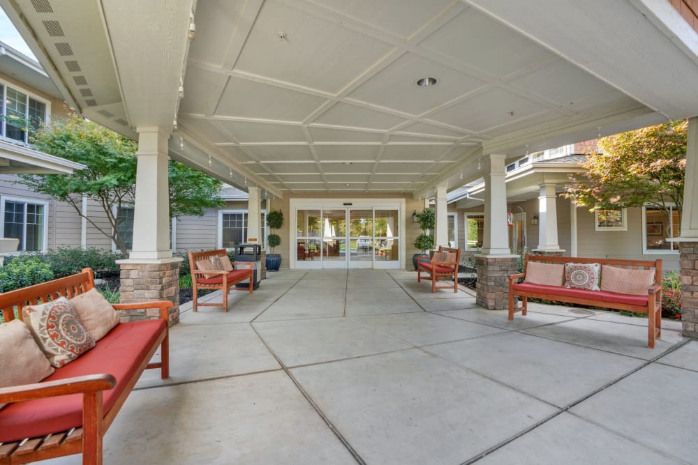 Covered seating area and entrance to The Commons at Elk Grove in Elk Grove, California