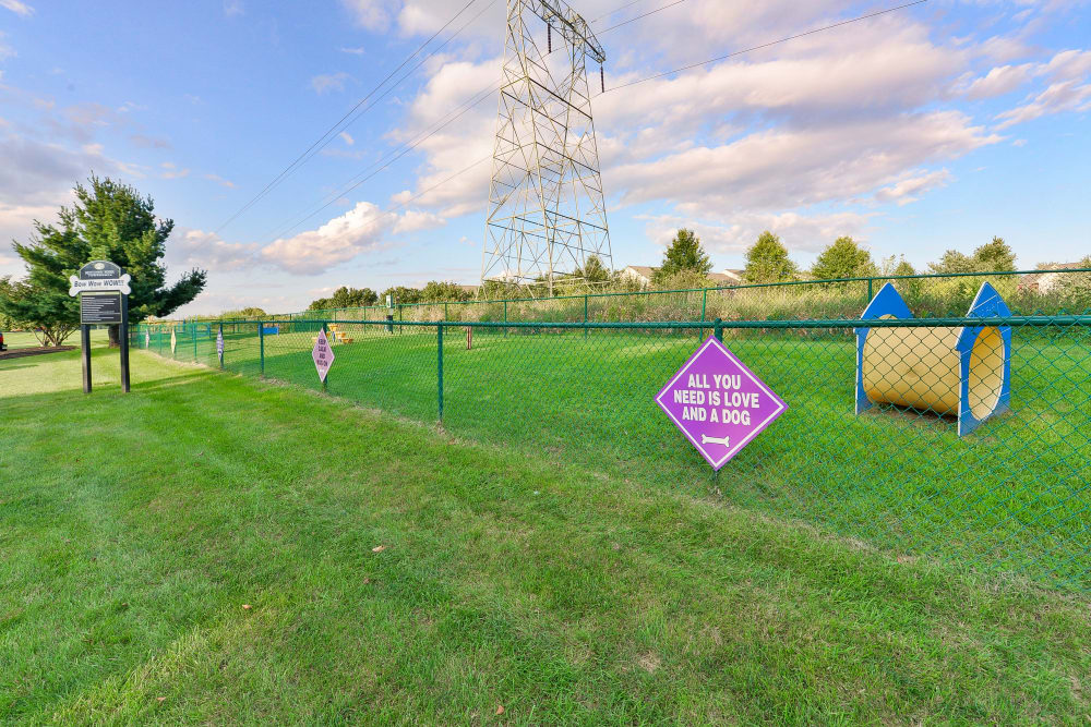 Dog park with agility equipment at Montgomery Woods Townhomes in Harleysville, Pennsylvania