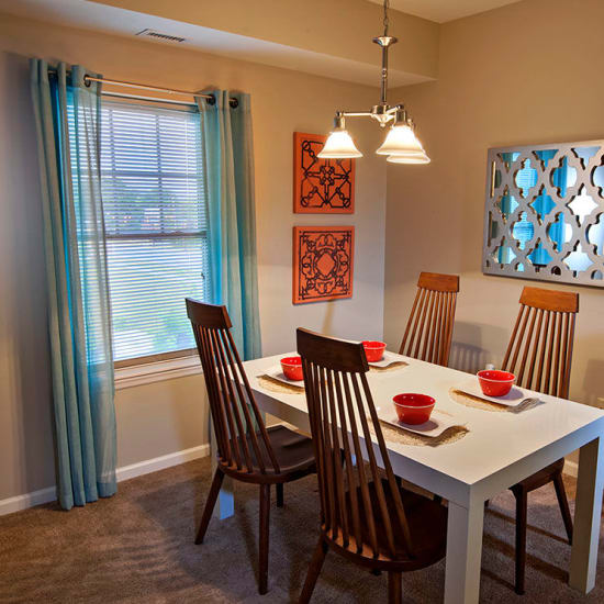 Well decorated bedroom at Rochester Village Apartments at Park Place in Cranberry Township, PA