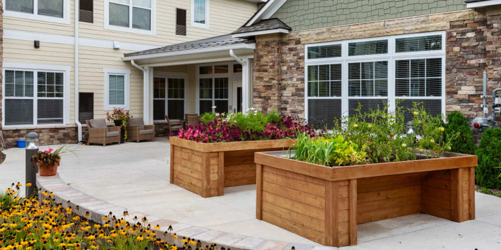 Outdoor raised garden beds at Anthology of Troy in Troy, Michigan