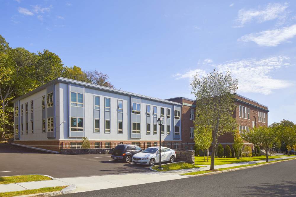 Exterior view of the apartment building at Senior Residence at The Machon in Swampscott, Massachusetts