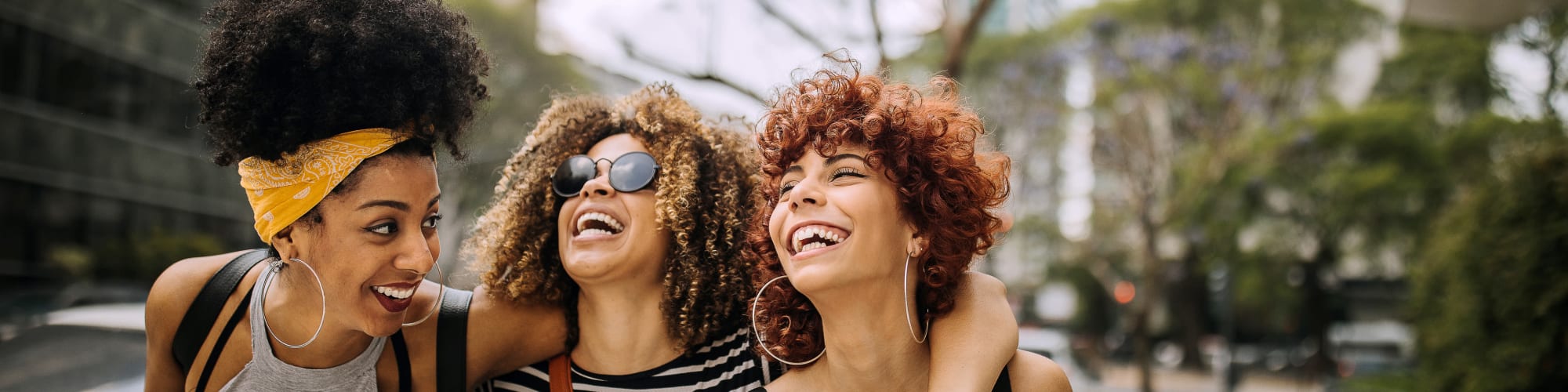 Diverse ladies laughing near Neighborhood | Shore Hill in Brooklyn, New York