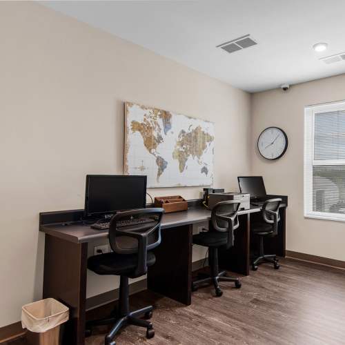 Community computer room with computers and laptops at Center Crossing in Hickory, North Carolina