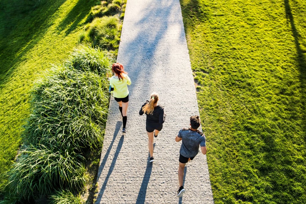 Residents enjoying a nearby running pace near Las Terrazas in Colton, California