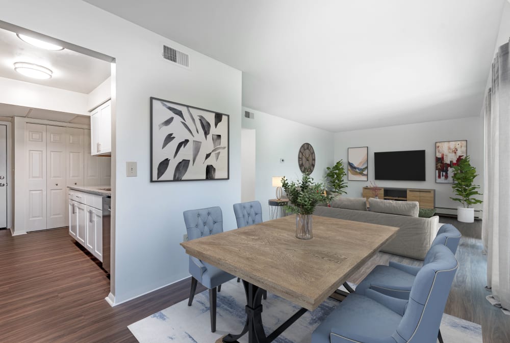 Spacious dining room at Steeplechase Apartments home in Camillus, New York